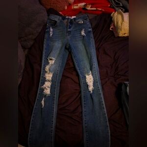 Dark wash ripped flared skinny jeans